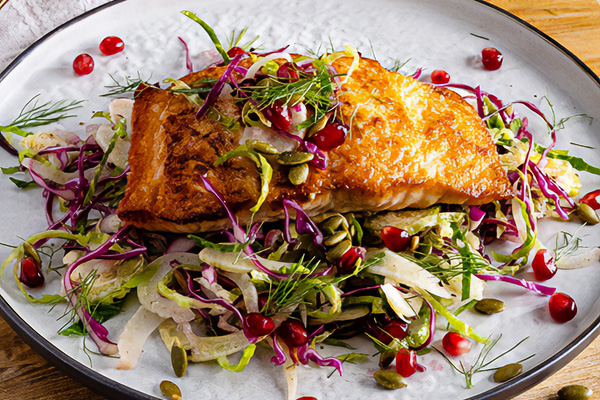 Salmon with Brussels Sprout Red Cabbage and Fennel Slaw
